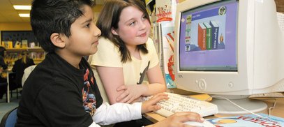 Two children at computer newsletter.jpg