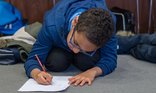 2 boy writing