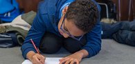 2 boy writing