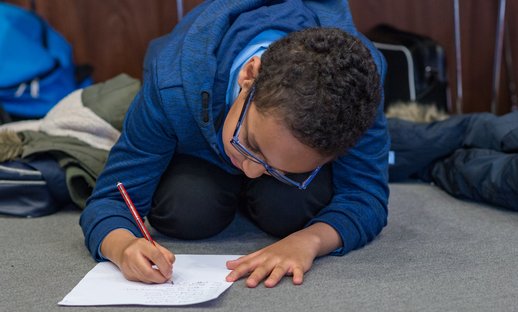 2 boy writing