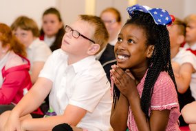Children enjoying the Young Readers Programme
