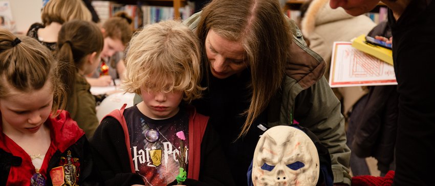 Parents and children worked together on crafts and puzzles.jpg
