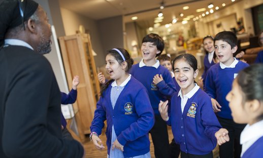 School children in uniform looking excited