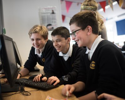 Secondary boys on computer