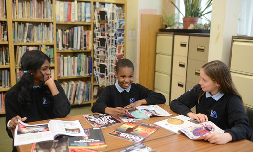 Reading magazines in library.jpg