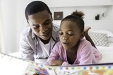 Dad and daughter reading