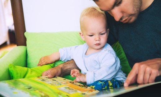 Dad reading with son.jpg