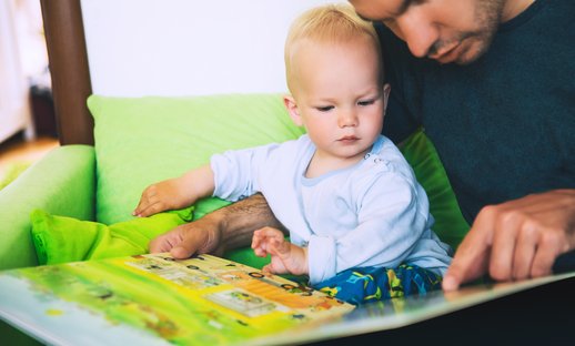 Dad reading with son.jpg