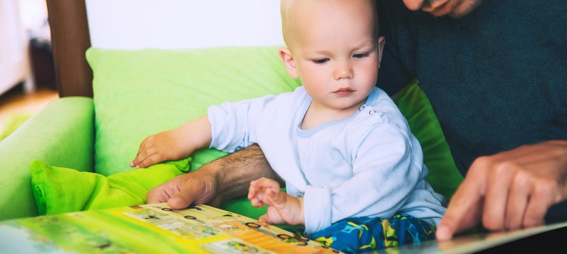 Dad reading with son.jpg