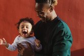 Dad and baby Early Words Matter close up