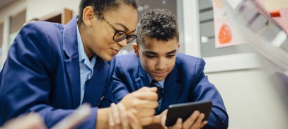 Girl & boy using tablet