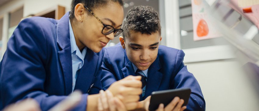 Girl & boy using tablet
