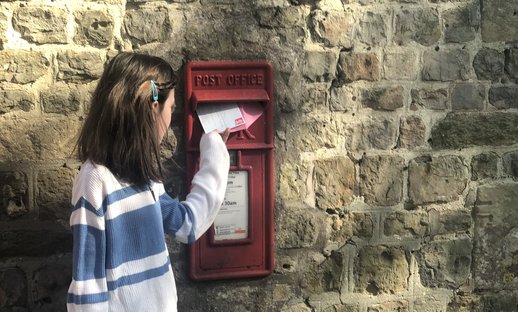 Girl posting letter