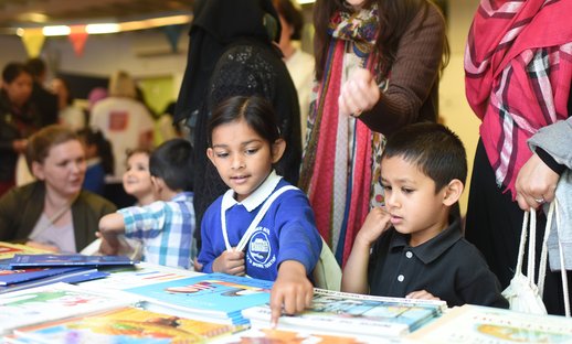 Looking_at_books.jpg