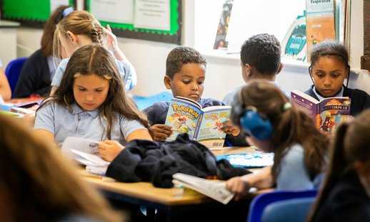 Children read books in school. Drake Circus - Young Readers Programme