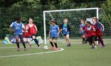 Girls playing football FA