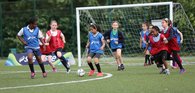 Girls playing football FA