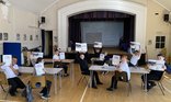 Spires jnr Students with workbooks.jpg