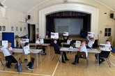 Spires jnr Students with workbooks.jpg