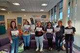 Swindon Stories LC's at storytime training holding certificates.jpg