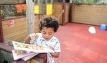 EWT @ 2 - baby with book