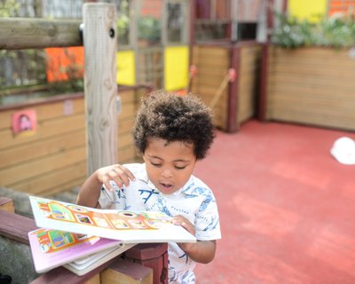 EWT @ 2 - baby with book