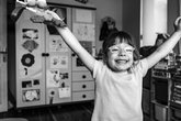 Young girl on her own looking happy