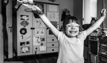 Young girl on her own looking happy