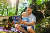 dad and baby, book