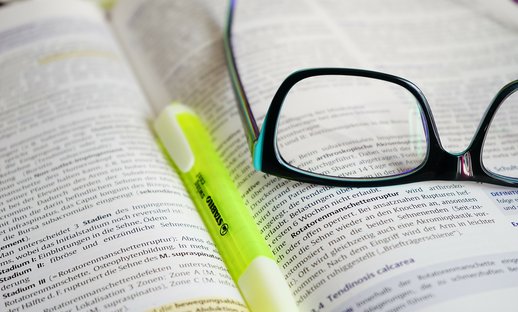 Notebook and glasses