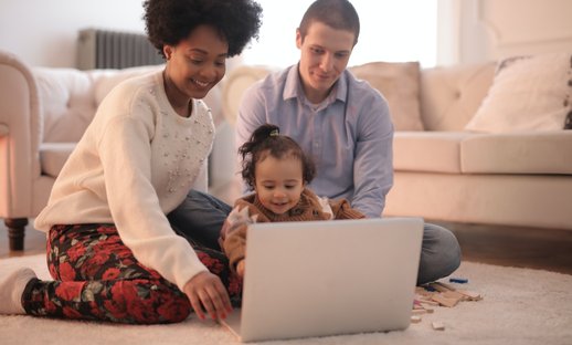 parents and child at laptop.jpg