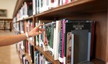 Picking a book at the library