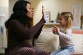 mum and daughter clapping.jpg